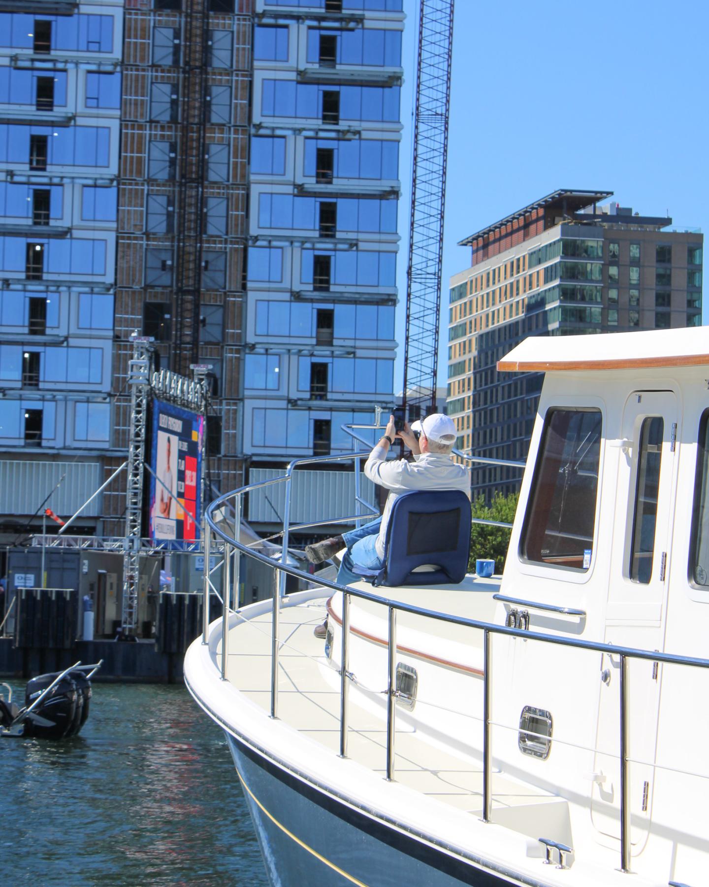 Spectators watch Red Bull Cliff Diving at Fan Pier Marina