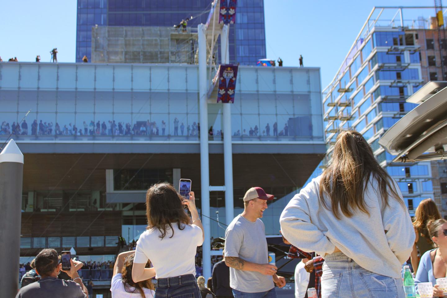 Spectators watch Red Bull Cliff Diving at Fan Pier Marina